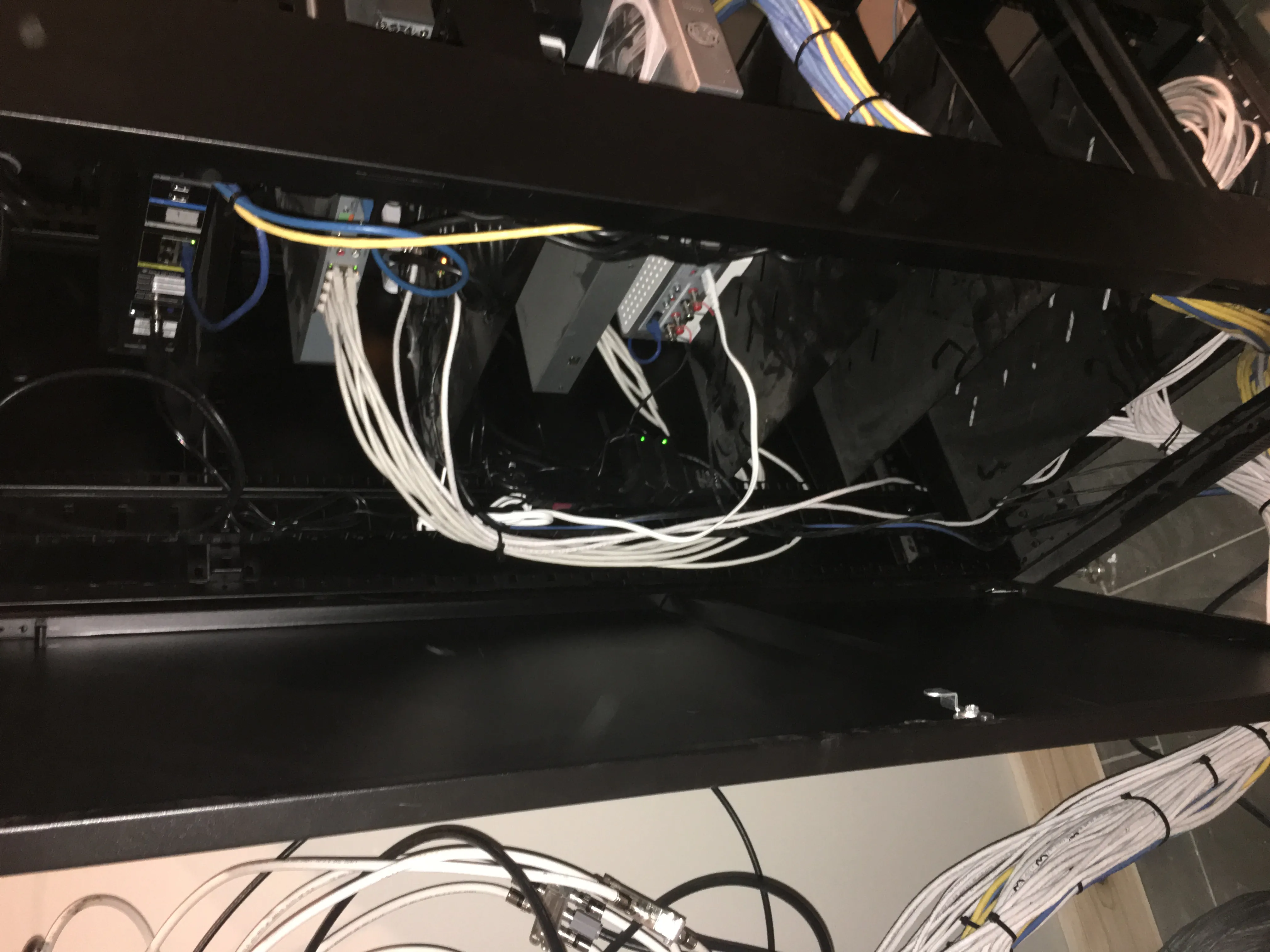 Open equipment rack during network and AV wiring