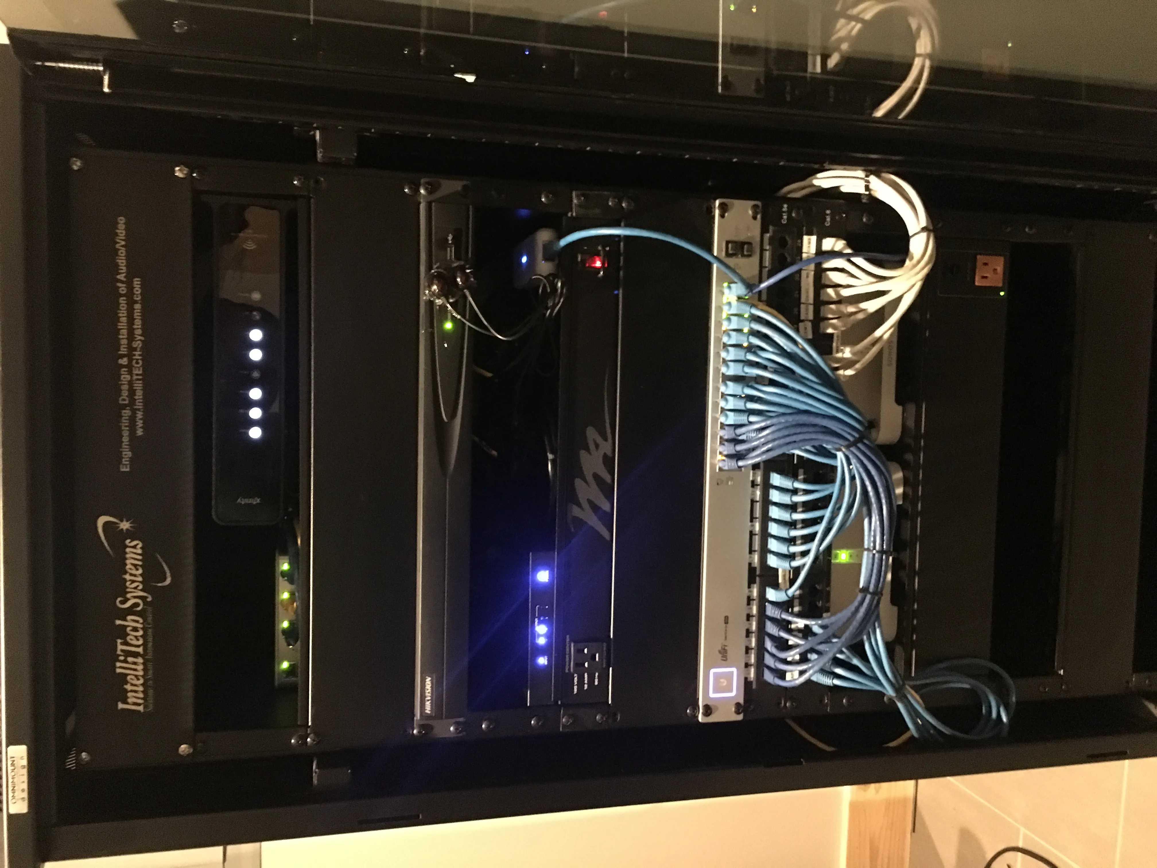 Completed equipment rack with network and AV hardware